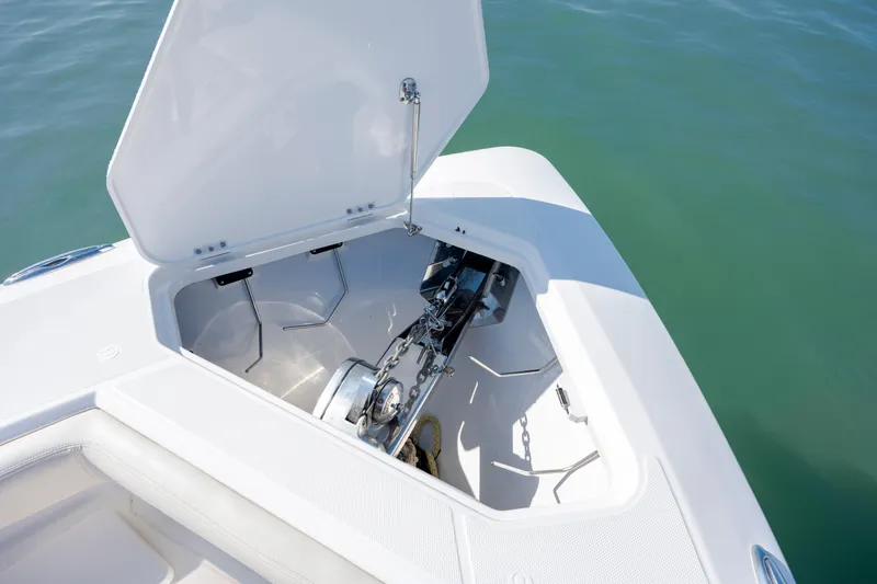  Yacht Photos Pics Open anchor compartment on 2022 Solace 41 CS boat, showing anchor mechanism.