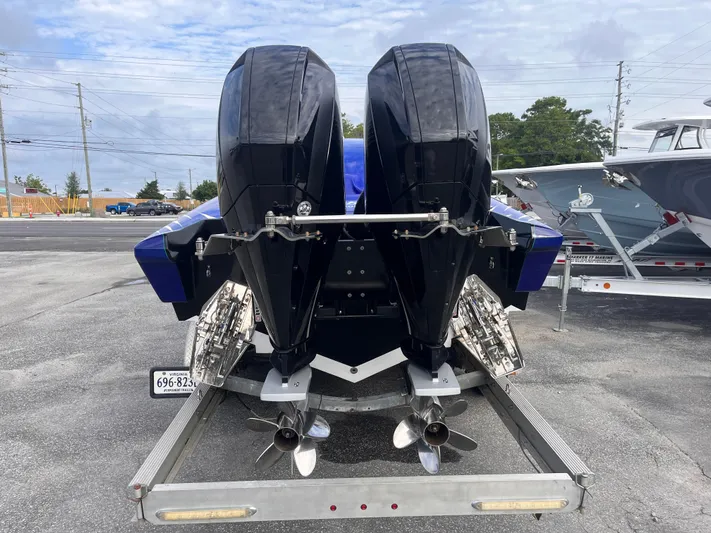  Yacht Photos Pics 2018 Lavey Craft 28 EVO boat with dual outboard motors on a trailer.