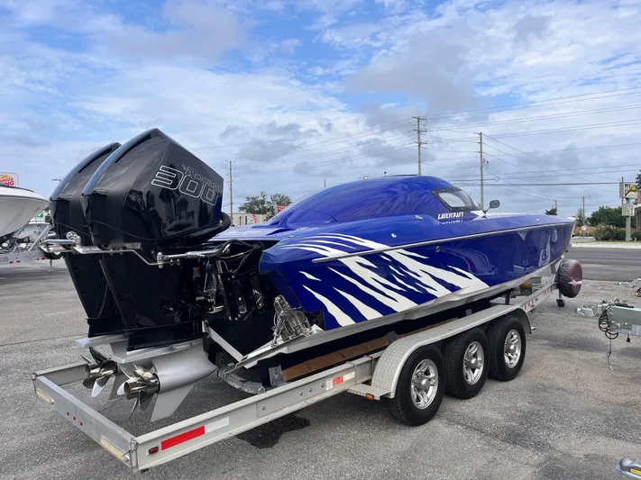  Yacht Photos Pics 2018 Lavey Craft 28 EVO boat on trailer with twin outboard engines.
