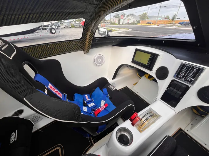  Yacht Photos Pics Interior of 2018 Lavey Craft 28 EVO boat with racing seat and control panel.