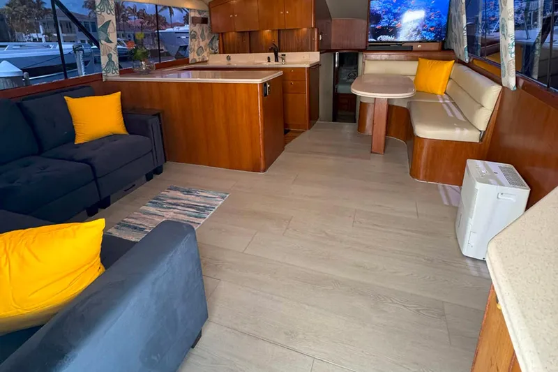 Happy Our's Yacht Photos Pics Luxurious interior of a 1997 Ocean Yachts 48 Super Sport with modern furnishings.