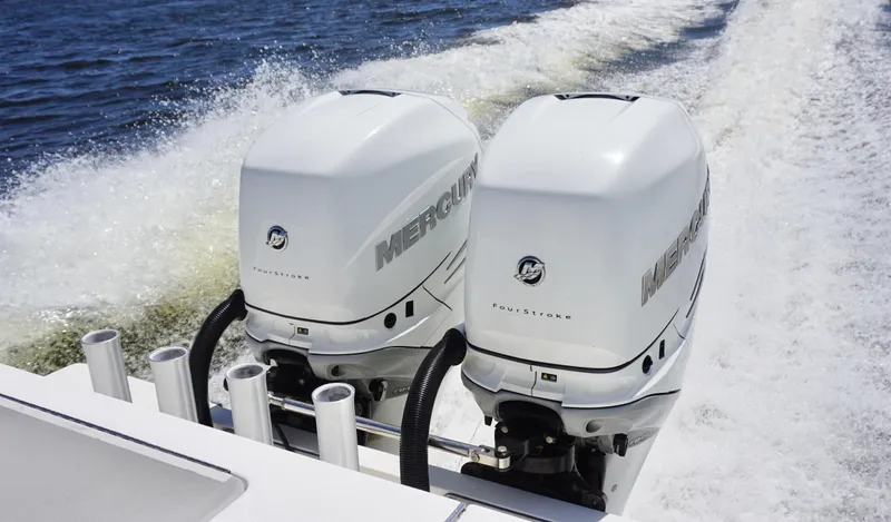  Yacht Photos Pics Twin Mercury outboard engines on a 2009 SeaVee 32OB boat cruising on water.