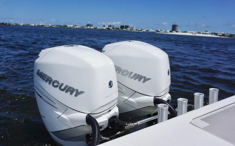  Yacht Photos Pics Twin Mercury outboard engines on a 2009 SeaVee 32OB boat, cruising on open water.