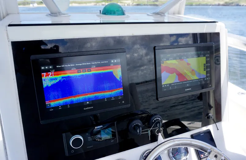  Yacht Photos Pics Console of 2009 SeaVee 32OB boat with navigation and sonar displays.