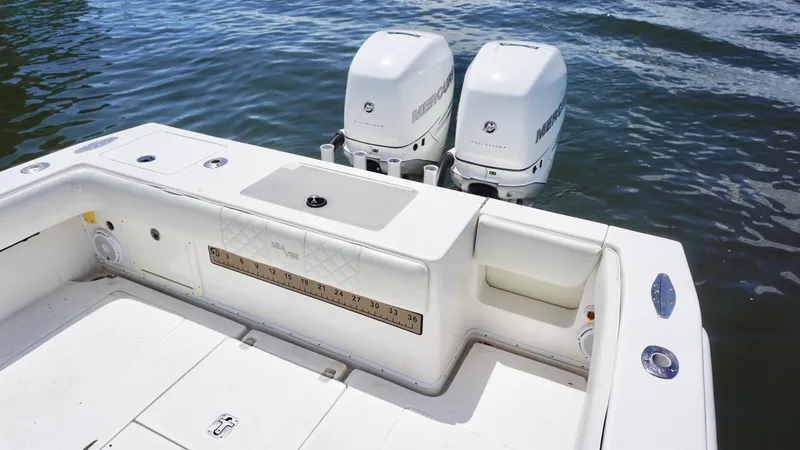  Yacht Photos Pics 2009 SeaVee 32OB boat with twin outboard engines on calm water.