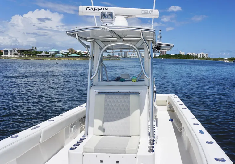  Yacht Photos Pics 2009 SeaVee 32OB boat with Garmin equipment on calm water, clear sky background.