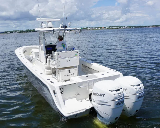  Yacht Photos Pics 2009 SeaVee 32OB boat with dual Mercury engines cruising on open water.