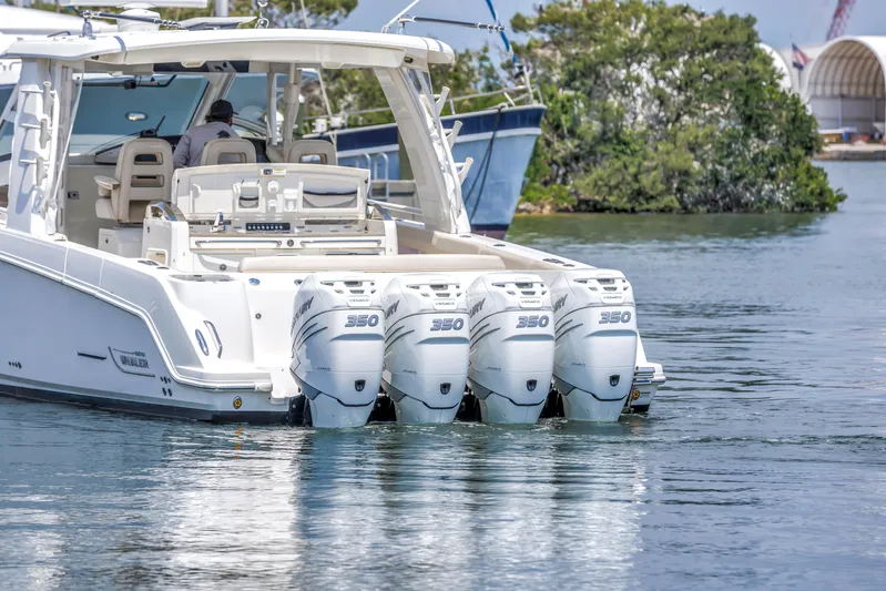  Yacht Photos Pics 2018 Boston Whaler 420 Outrage with four powerful engines on calm water.