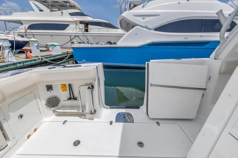  Yacht Photos Pics 2018 Boston Whaler 420 Outrage boat interior at marina, featuring sleek design and modern amenities.