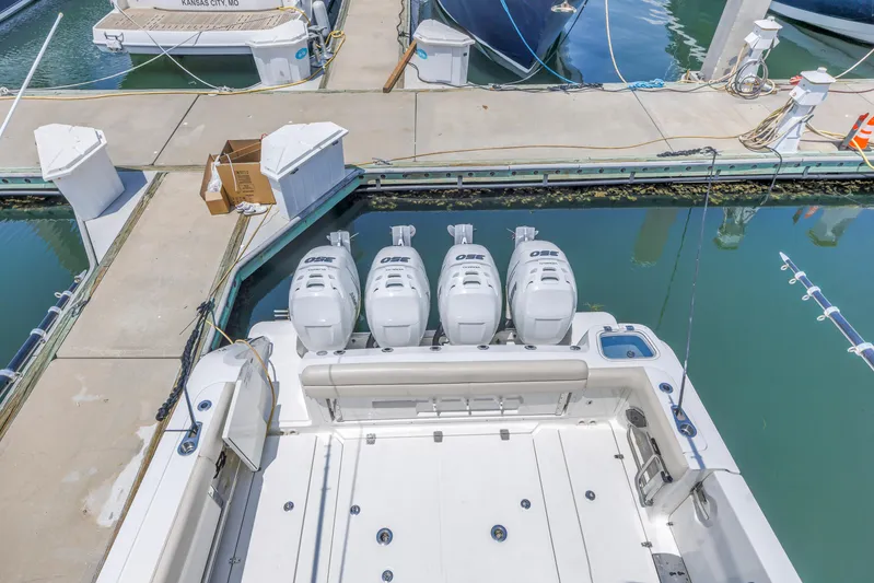  Yacht Photos Pics 2018 Boston Whaler 420 Outrage with quad engines docked at marina.