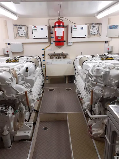 Hasard Yacht Photos Pics Engine room of a 2002 Ferretti Yachts 720 with two large engines.