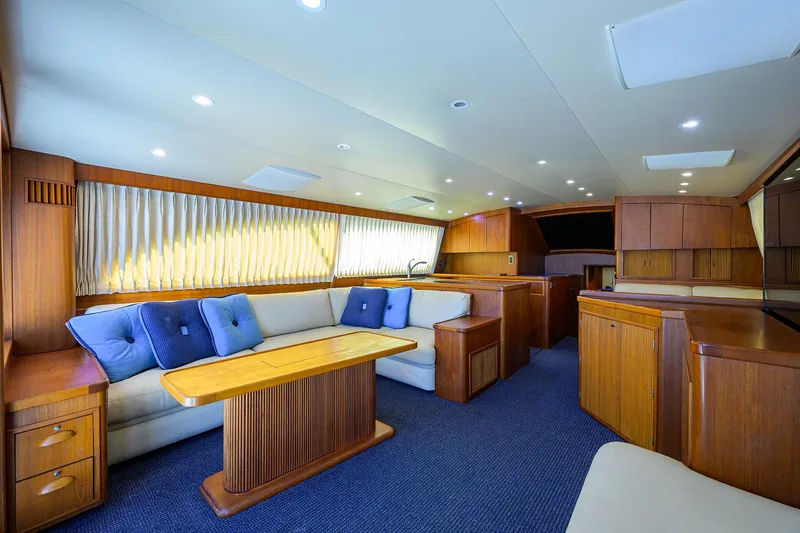 Hurricane Yacht Photos Pics Luxurious interior of a 1997 Garlington 61 Convertible yacht with elegant wood finishes.