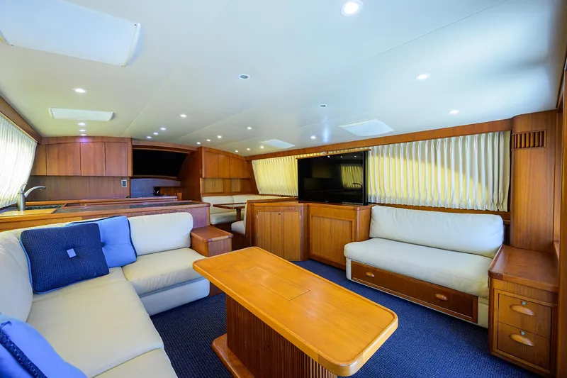 Hurricane Yacht Photos Pics Luxurious interior of a 1997 Garlington 61 Convertible yacht with elegant wood finishes.