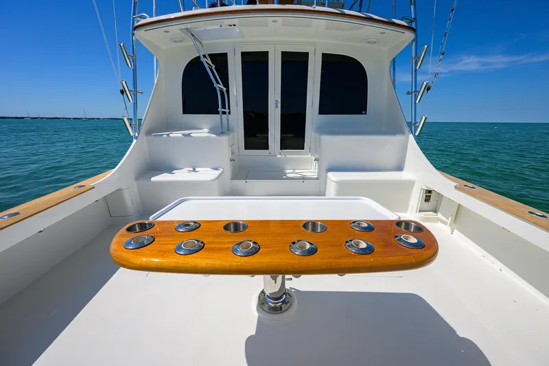 Hurricane Yacht Photos Pics 1997 Garlington 61 Convertible yacht deck with rod holders, ocean view.