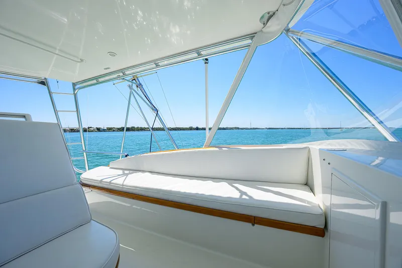 Hurricane Yacht Photos Pics 1997 Garlington 61 Convertible yacht interior with white seating and ocean view.