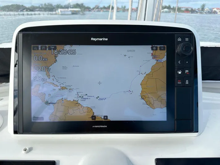 Uni Yacht Photos Pics Raymarine navigation display on 2023 Lagoon 46 catamaran, showing nautical map and speed data.