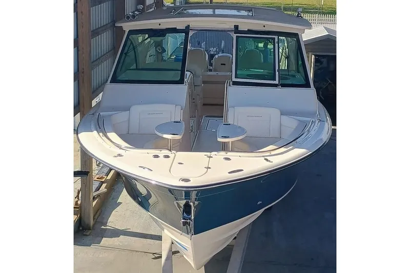 375-307 Brokerage Ron Yacht Photos Pics 2025 Grady-White Freedom 375 boat in storage, showcasing sleek design and spacious deck.