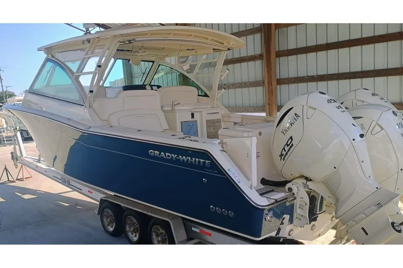 375-307 Brokerage Ron Yacht Photos Pics 2025 Grady-White Freedom 375 boat with Yamaha engines in a storage facility.