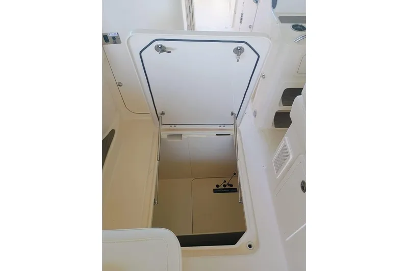 375-307 Brokerage Ron Yacht Photos Pics 2025 Grady-White Freedom 375 boat hatch, open to reveal storage compartment.