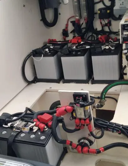 2021 Sea Ray 350 Sundancer @ Cancun Yacht Photos Pics Battery compartment of 2021 Sea Ray Sundancer 350 with multiple batteries and wiring.