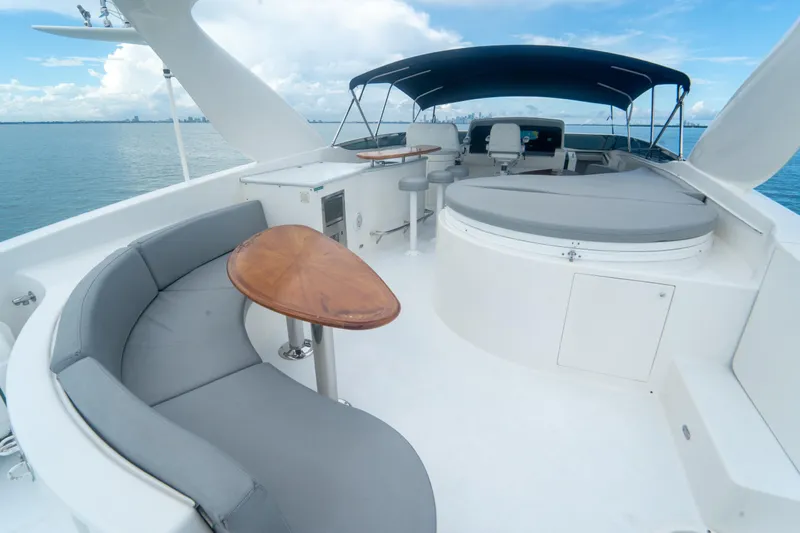 Living The Dream Yacht Photos Pics Luxurious 2008 Lazzara 84 Open Bridge yacht with spacious seating and ocean view.