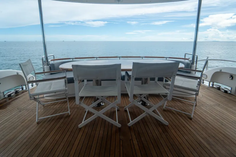 Living The Dream Yacht Photos Pics Luxury yacht deck with chairs, ocean view; 2008 Lazzara 84 Open Bridge.