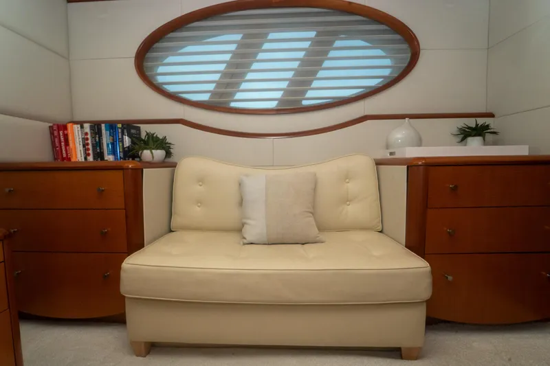 Living The Dream Yacht Photos Pics Luxurious interior of 2008 Lazzara 84 Open Bridge yacht with elegant seating and decor.