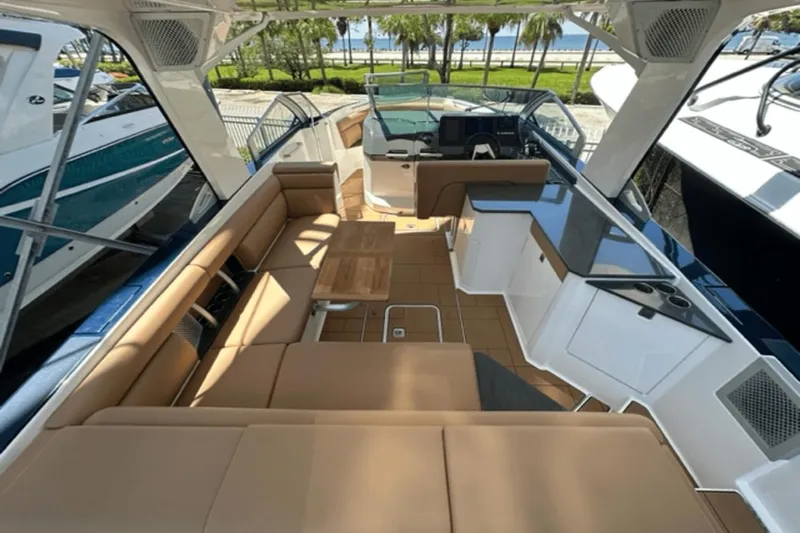  Yacht Photos Pics Luxurious 2022 Aviara AV32 Outboard boat interior with spacious seating and modern amenities.