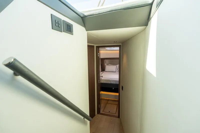 Eclipse 505 Shadow 003 Yacht Photos Pics Modern interior hallway of 2026 ECLIPSE 505 Shadow yacht, leading to a cozy bedroom.