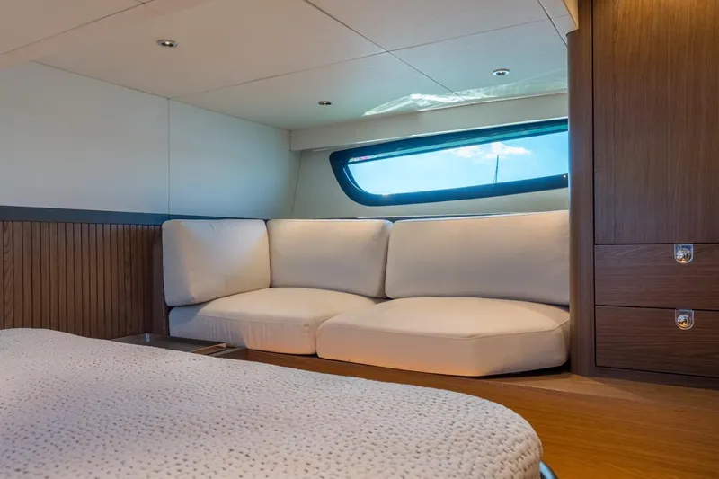 Eclipse 505 Shadow 003 Yacht Photos Pics Luxurious interior of 2026 ECLIPSE 505 Shadow yacht with cozy seating and modern design.