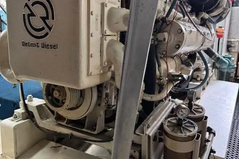 Andiamo Yacht Photos Pics 1982 Hatteras Enclosed Flybridge engine room with Detroit Diesel engine.