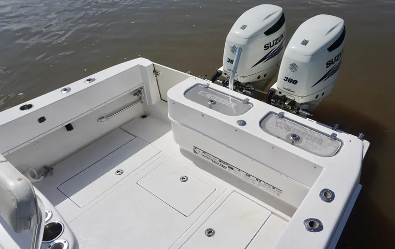  Yacht Photos Pics 2003 Contender 31 Open boat with dual Suzuki 300 engines, spacious deck, and fishing amenities.