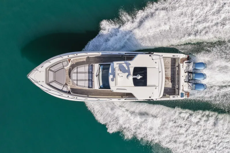  Yacht Photos Pics Aerial view of 2023 Boston Whaler 420 Outrage on water.