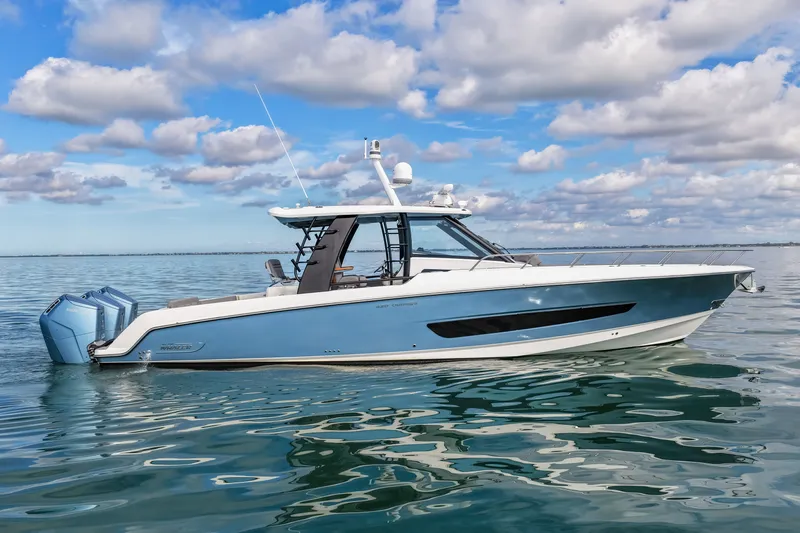  Yacht Photos Pics 2023 Boston Whaler 420 Outrage on calm waters.