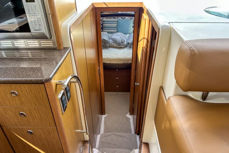  Yacht Photos Pics Interior of 2015 Meridian 441 Sedan yacht, featuring a cozy cabin and modern amenities.