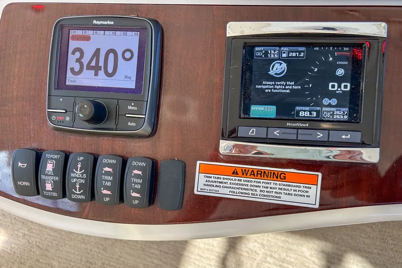  Yacht Photos Pics Control panel of a 2015 Meridian 441 Sedan with navigation and system displays.