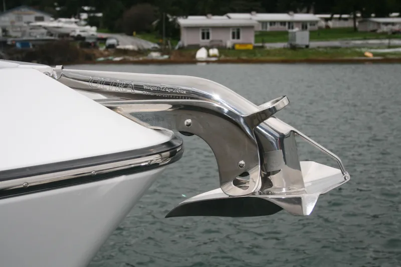Catcher Yacht Photos Pics 2019 Ocean Sport Roamer 30 #117 with stainless steel anchor in marina setting.