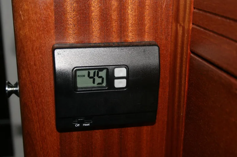 Catcher Yacht Photos Pics Digital thermostat on Ocean Sport Roamer 30 #117, displaying room temperature of 45.