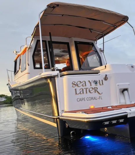  Yacht Photos Pics 2022 Ranger Tugs R-27 boat with canopy, "Sea You Later," Cape Coral, FL.