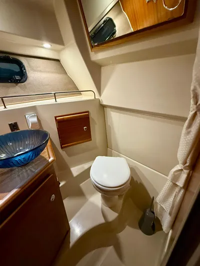  Yacht Photos Pics 2022 Ranger Tugs R-27 bathroom with modern sink and toilet.