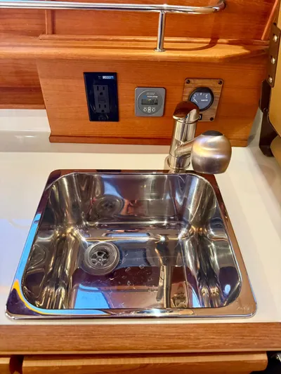  Yacht Photos Pics Stainless steel sink in 2022 Ranger Tugs R-27 boat interior.