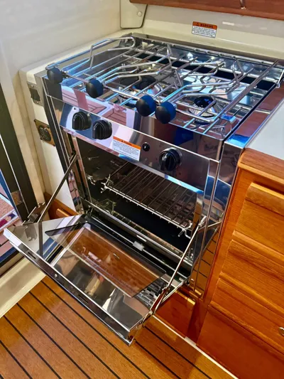  Yacht Photos Pics Stainless steel stove and oven in 2022 Ranger Tugs R-27 boat interior.