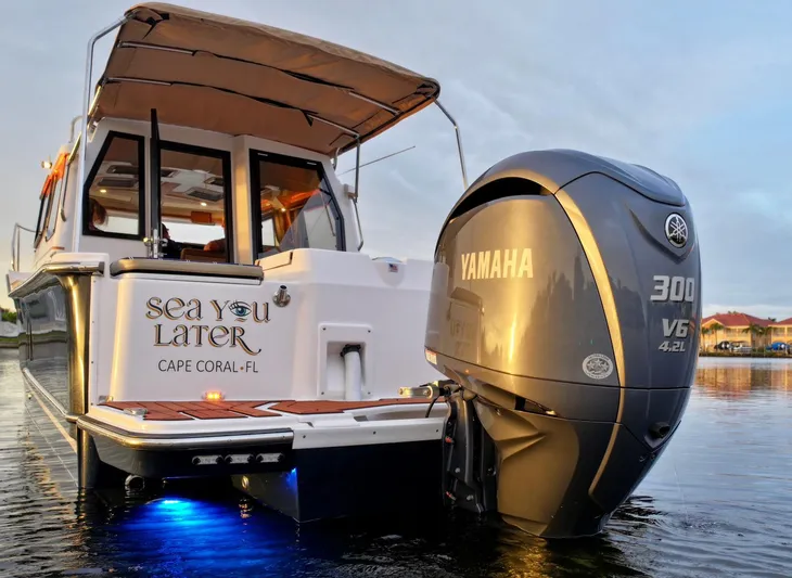  Yacht Photos Pics 2022 Ranger Tugs R-27 boat with Yamaha engine, docked in Cape Coral, FL.