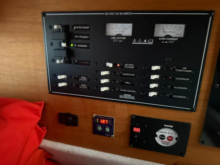  Yacht Photos Pics Electrical control panel on a 2022 Ranger Tugs R-27 boat interior.