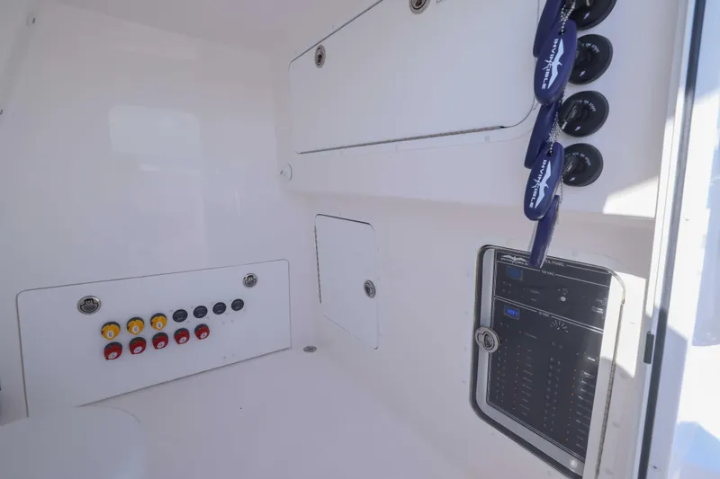  Yacht Photos Pics 2025 Invincible 35 Catamaran control panel with switches and gauges.