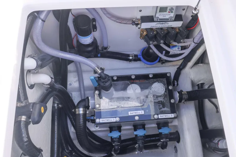  Yacht Photos Pics Engine compartment of 2025 Invincible 35 Catamaran with visible hoses and components.