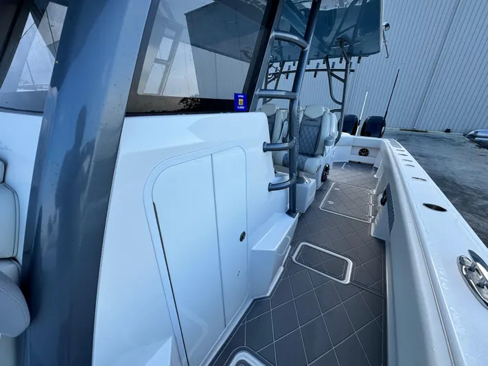  Yacht Photos Pics 2022 Invincible 40 Catamaran interior with sleek design and modern seating.