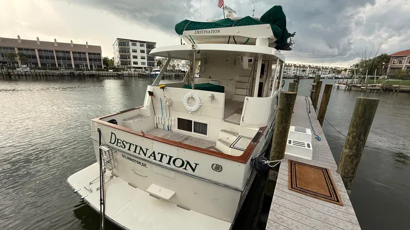 Destination Yacht Photos Pics 1995 Ocean Alexander 546 yacht docked at marina, overcast sky, Wilmington, DE.