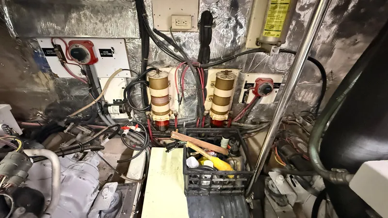 Destination Yacht Photos Pics Engine room of 1995 Ocean Alexander 546 yacht, showing wiring and equipment.