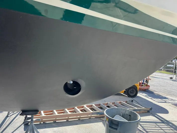 Destination Yacht Photos Pics Bottom view of a 1995 Ocean Alexander 546 yacht hull in a shipyard.